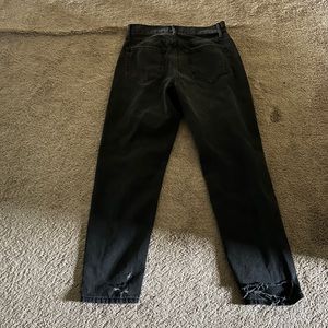 Black washed mom jeans with rips